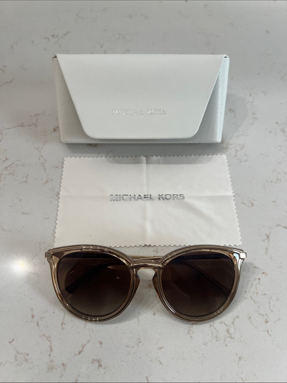 NWOT Michael Kors Brisbane brown gradient and gold sunglasses.
